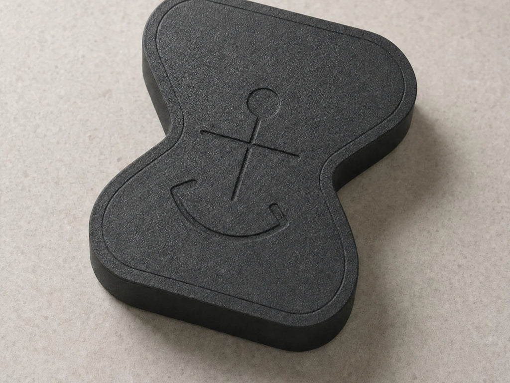 Close-up detail of the matte-black Anchor physical app blocker