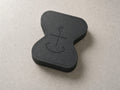 Matte-black Anchor physical app blocker, shown at a three-quarter angle